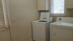 Utility Room with Full sized Washer and Dryer